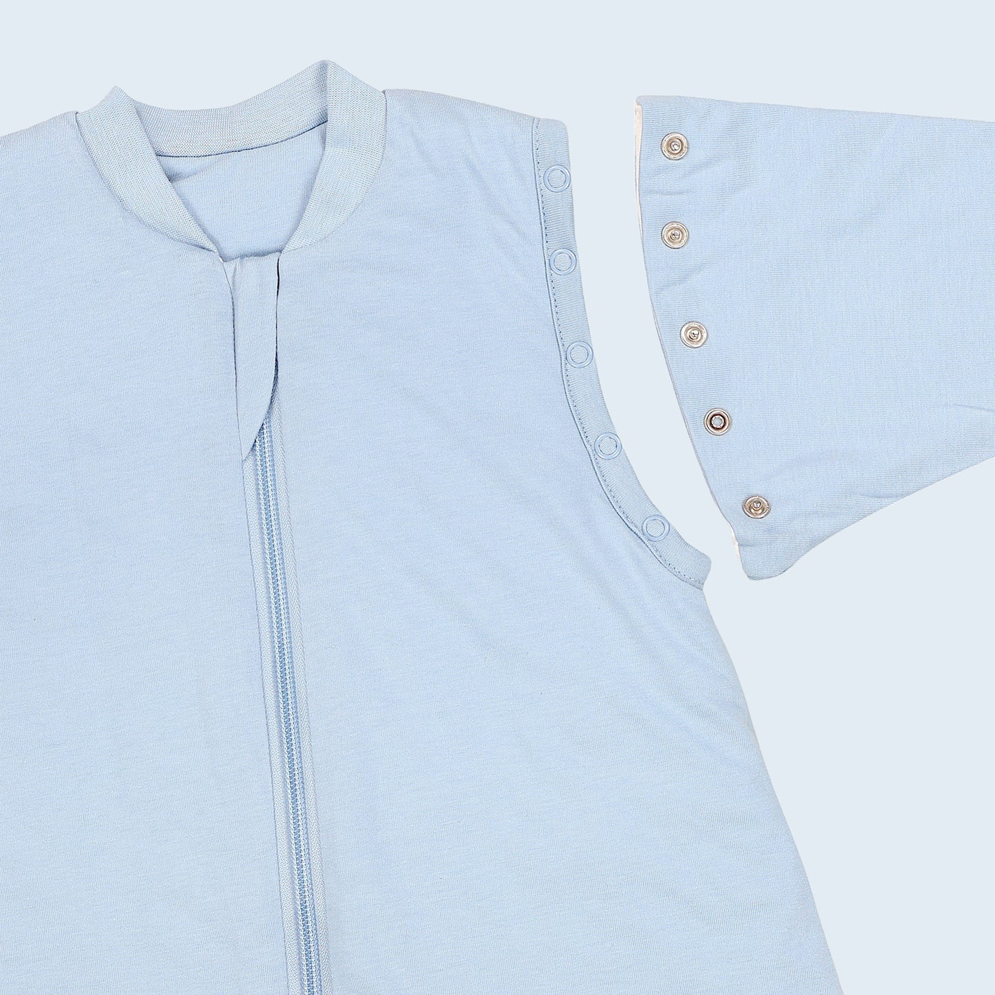 Saco de dormir con pies y suelas antideslizantes 3.5 TOG_Azul Hielo_zona del brazo_1209